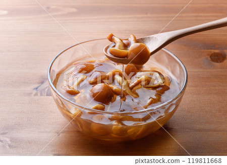 Domestic nameko mushrooms in a transparent container with a unique slimy texture and flavor Domestic nameko mushrooms in a transparent container with a unique slimy texture and flavor 119811668