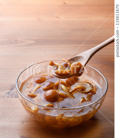 Domestic nameko mushrooms in a transparent container with a unique slimy texture and flavor Domestic nameko mushrooms in a transparent container with a unique slimy texture and flavor 119811670