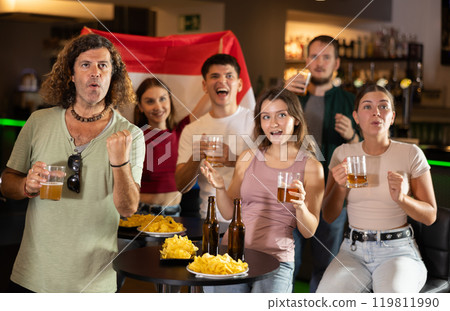 Group of fans in bar with Netherlands flag 119811990