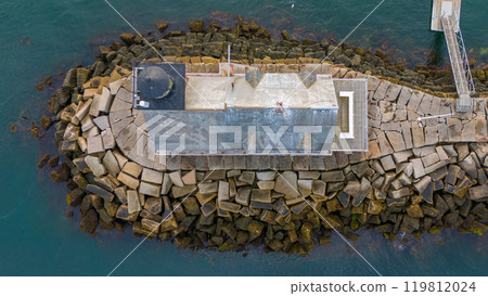 Direct overhead view of Rockland Breakwater Lighthouse in harbor on the Gulf of Maine  119812024