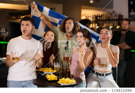 Group of fans in bar with Greek flag 119812099