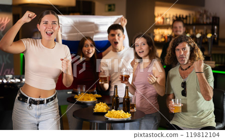 Group of fans in bar with Russian flag 119812104