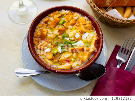Fresh and light traditional Cojondongo from Extremadura in clay bowl 119812122