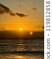 <Izu> The morning sun rising behind Oshima and the shoreline 119812858