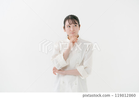 Portrait of a thinking female chef Portrait of a thinking female chef 119812860