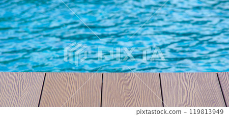 Wooden floor of swimming pool with customizable space for text or ideas. Copy space and holiday concept 119813949