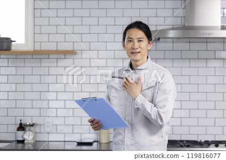 Housing sales man checking the kitchen 119816077
