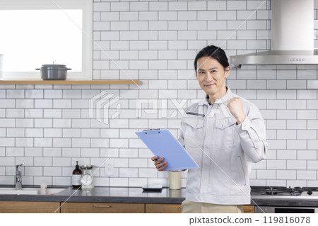 Housing sales man checking the kitchen 119816078