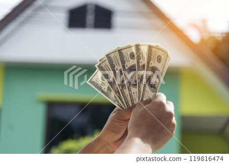 Hand holding loan money dollar bank note give financial payment. Man hands showing spread 100 dollar exchange cash payout. Saving Businessman counting money banknote bribe corruption concept. Hand holding loan money dollar bank note give financial payment. Man hands showing spread 100 dollar exchange cash payout. Saving Businessman counting money banknote bribe corruption concept. 119816474