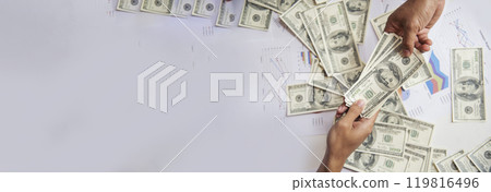 Banner Hand holding loan money dollar bank note financial payment. Banner Man hands showing spread 100 dollar exchange cash with copy space. Saving Businessman money banknote bribe corruption concept Banner Hand holding loan money dollar bank note financial payment. Banner Man hands showing spread 100 dollar exchange cash with copy space. Saving Businessman money banknote bribe corruption concept 119816496