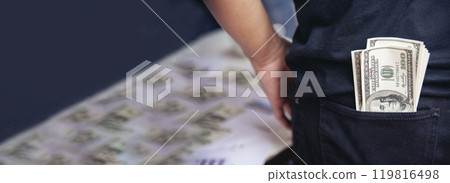 Banner Hand holding loan money dollar bank note financial payment. Banner Man hands showing spread 100 dollar exchange cash with copy space. Saving Businessman money banknote bribe corruption concept 119816498