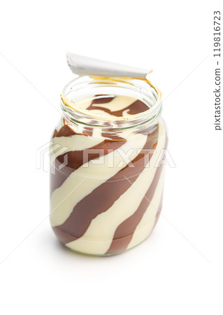 Chocolate cream spread isolated on white background. Chocolate cream spread isolated on white background. 119816723