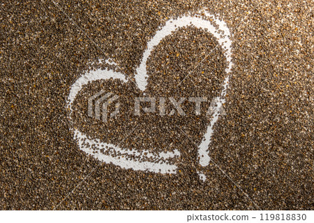 Heart made of chia seeds background. Healthy superfood rich in Omega 3 fatty acids. Dry healthy natural ingredient. Vegetarian food favorite dietary 119818830