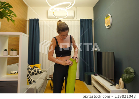 A young woman have a joyfully yoga practice  119821048