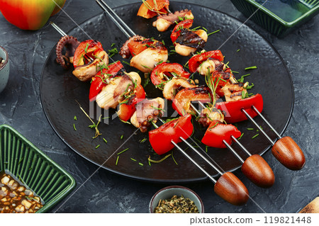 Octopus Skewers with pepper, grilled seafood delicacy. Octopus Skewers with pepper, grilled seafood delicacy. 119821448