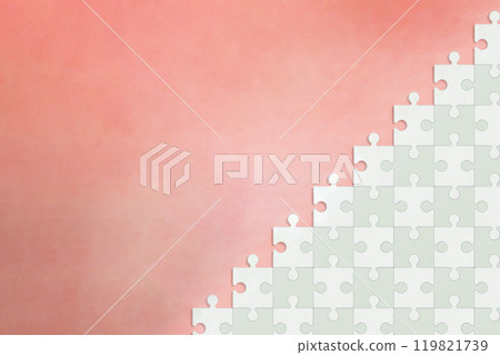 Edges of a stepped jigsaw puzzle on a pink background Edges of a stepped jigsaw puzzle on a pink background 119821739