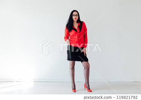 Portrait of a beautiful brunette woman in business clothes Portrait of a beautiful brunette woman in business clothes 119821792