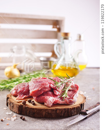 raw beaf on a light table. raw beaf on a light table. 119822170