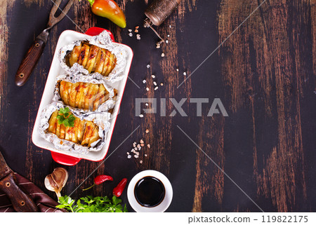 Baked potato with meat and cheese 119822175