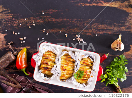 Baked potato with meat and cheese Baked potato with meat and cheese 119822176