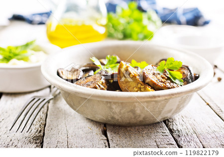 fried egg plant with fresh greens fried egg plant with fresh greens 119822179