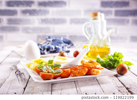 fried seafood (shrimps and squid) with tomato and corn porridge 119822199