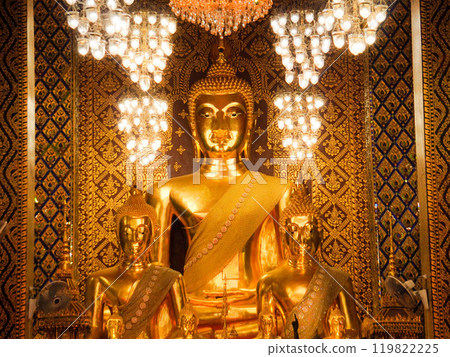 Serene golden Buddha statue in a Thai temple. 119822225