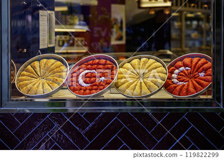 Turkish baklava pastries arranged in shape of the Turkish flag, vibrant colors of national symbol 119822299
