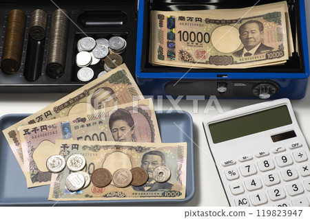 Illustration of settlement using a portable safe and cash Illustration of settlement using a portable safe and cash 119823947