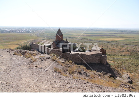 Ancient Armenian Apostolic Church on a hilltop overlooking a vast plain 119823962