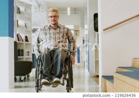 Portrait of Caucasian man using wheelchair while confidently navigating modern office space's bright and spacious hallways, showcasing determination and inclusion 119826436