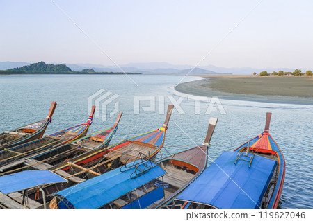 Close up Small fishing boats anchored in the sea 119827046