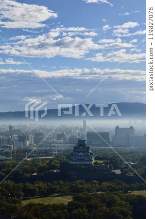 Osaka Castle floating in the morning mist, Mount Ikoma, Osaka and Nara, Osaka Castle Park, Osaka Prefectural Office, morning mist, ancient mountains, Osaka 119827078