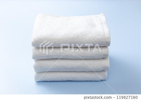 White towel on a blue background 119827160