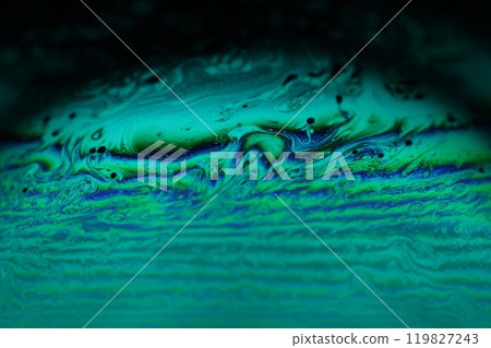 Bright rainbow reflection of liquid in macro, white colors, surrealistic background, fantastic smooth movement Bright rainbow reflection of liquid in macro, white colors, surrealistic background, fantastic smooth movement 119827243