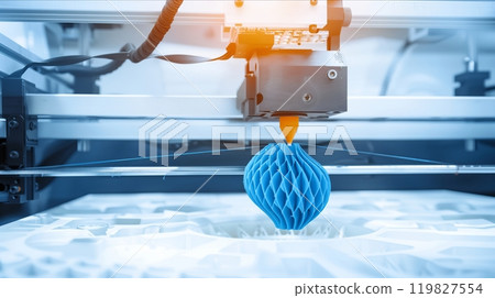 3D Printer Creating a Detailed Blue Honeycomb Structure in a Modern Workshop 119827554