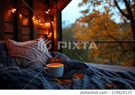 Cozy autumn scene with a cup of coffee, warm, autumn, coffee, relaxation, peaceful. Generative AI. 119828133