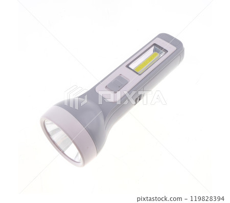Plastic LED flashlight in green color. Portable flashlight isolate on a white background. Plastic LED flashlight in green color. Portable flashlight isolate on a white background. 119828394