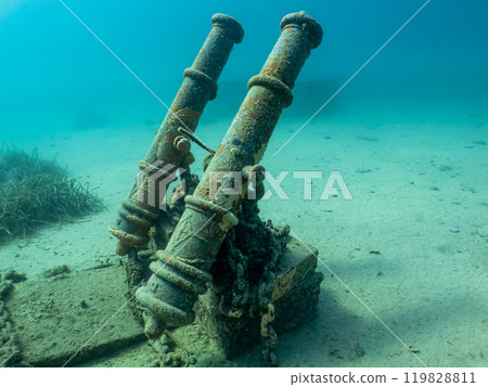 Two old cannons as a part of an artificial reef in the Adriatic Sea. Beautiful turquoise water 119828811