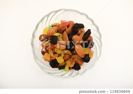 Assorted nuts in a cup. A delicious nutty snack. 119830609