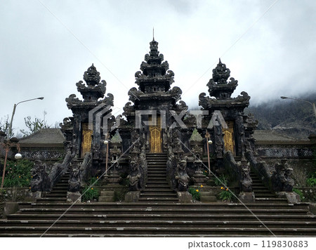 Majestic ancient black temple Pura Pasar Agung Sebudi on the sacred Mount Agung Majestic ancient black temple Pura Pasar Agung Sebudi on the sacred Mount Agung 119830883