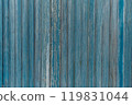 Garage door boards stained blue with worn paint. 119831044