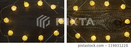 christmas garland lights on black wooden background with copy space for your text. Top view 119831228