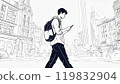 A young man walking around town using a smartphone 119832904