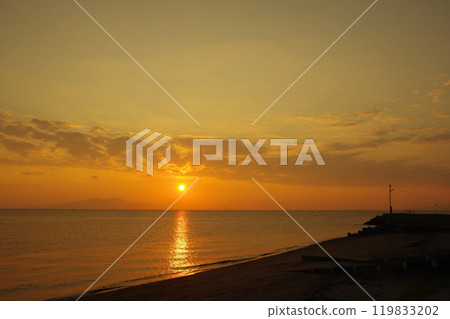 View of the Ariake Sea and the sunrise from Takeshima Beach in Shimabara City View of the Ariake Sea and the sunrise from Takeshima Beach in Shimabara City 119833202