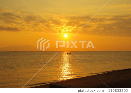 View of the Ariake Sea and the sunrise from Takeshima Beach in Shimabara City View of the Ariake Sea and the sunrise from Takeshima Beach in Shimabara City 119833203