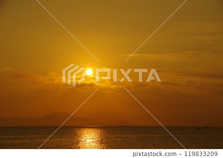 View of the Ariake Sea and the sunrise from Takeshima Beach in Shimabara City View of the Ariake Sea and the sunrise from Takeshima Beach in Shimabara City 119833209