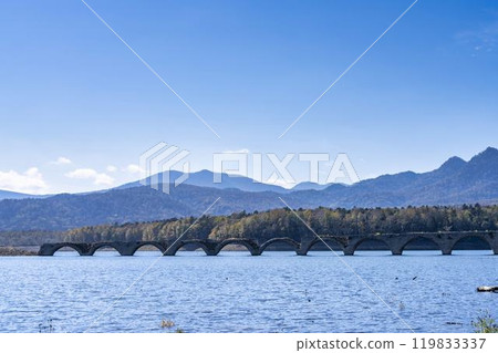 Taushubetsu River Bridge on the former Shihoro Line of the Japanese National Railways on a clear autumn day in Kamishihoro, Hokkaido 119833337