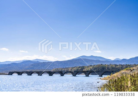 Taushubetsu River Bridge on the former Shihoro Line of the Japanese National Railways on a clear autumn day in Kamishihoro, Hokkaido 119833338