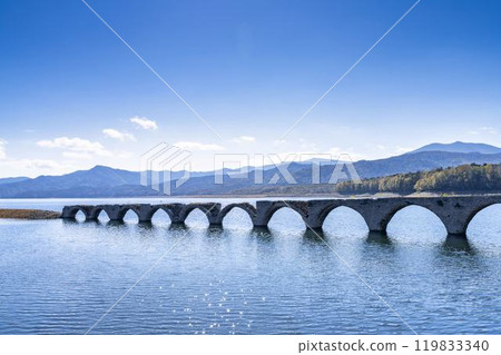 Taushubetsu River Bridge on the former Shihoro Line of the Japanese National Railways on a clear autumn day in Kamishihoro, Hokkaido 119833340
